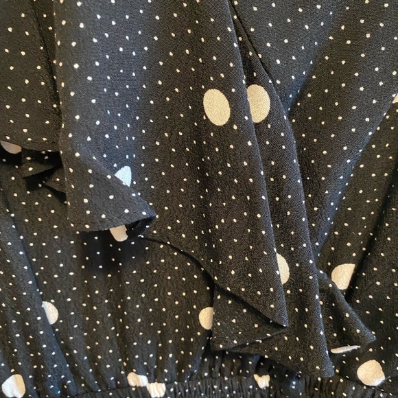 Black and white polka dot dress with ruffle front. - Picture 3 of 5